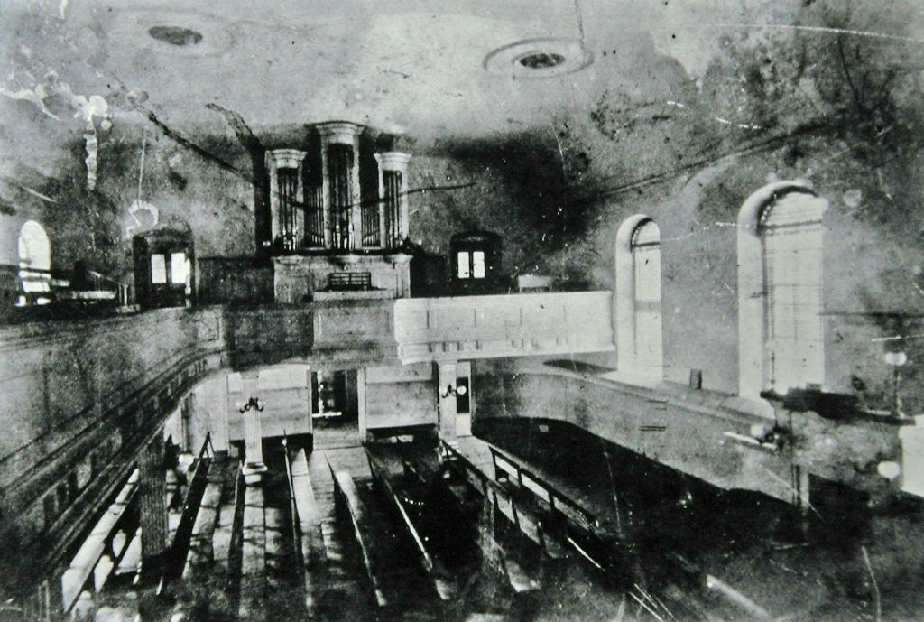 Earliest known photo of the organ in Home Moravian Church, c. 1860. Photo courtesy of Old Salem, Inc. 